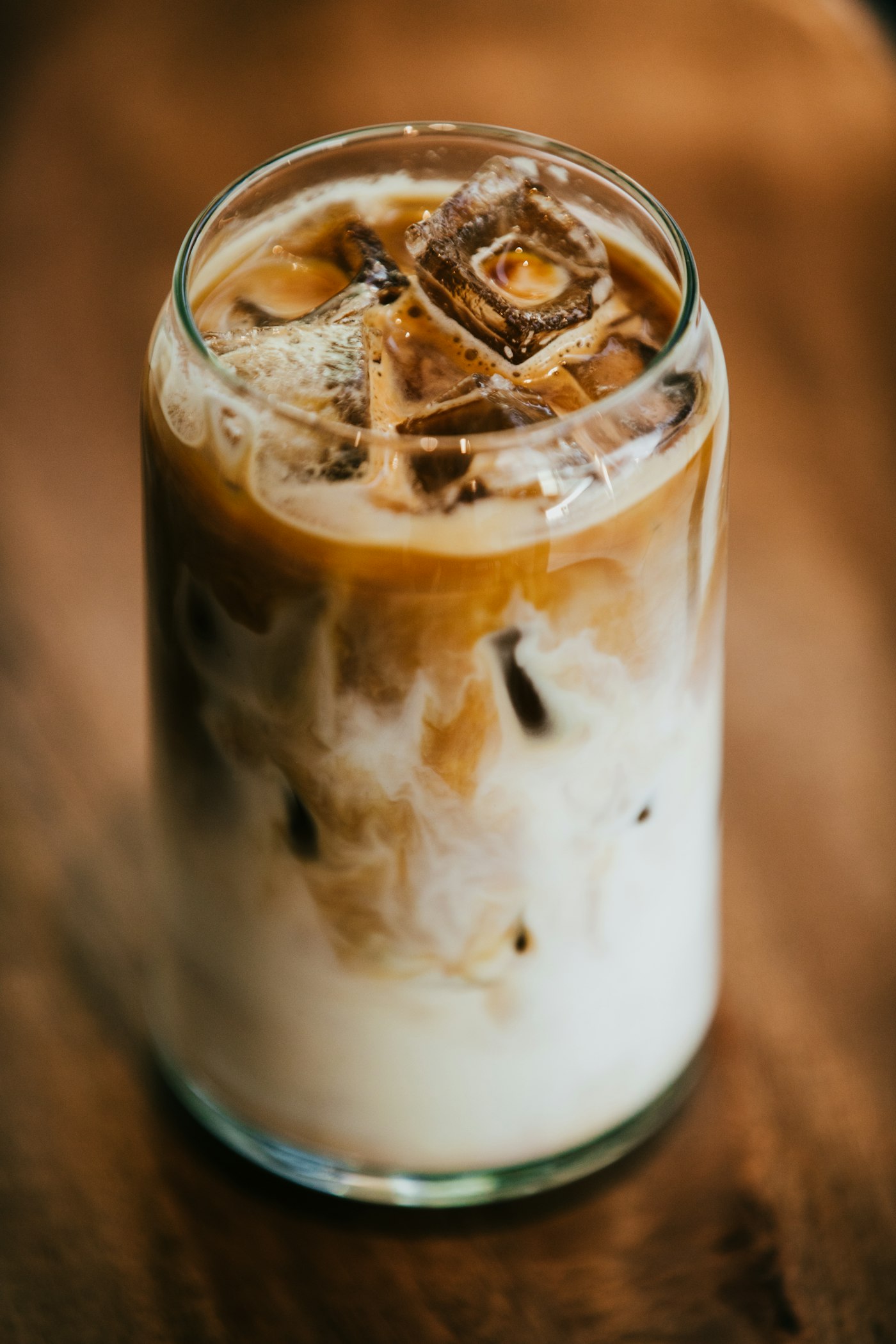 Creamy iced latte over ice
